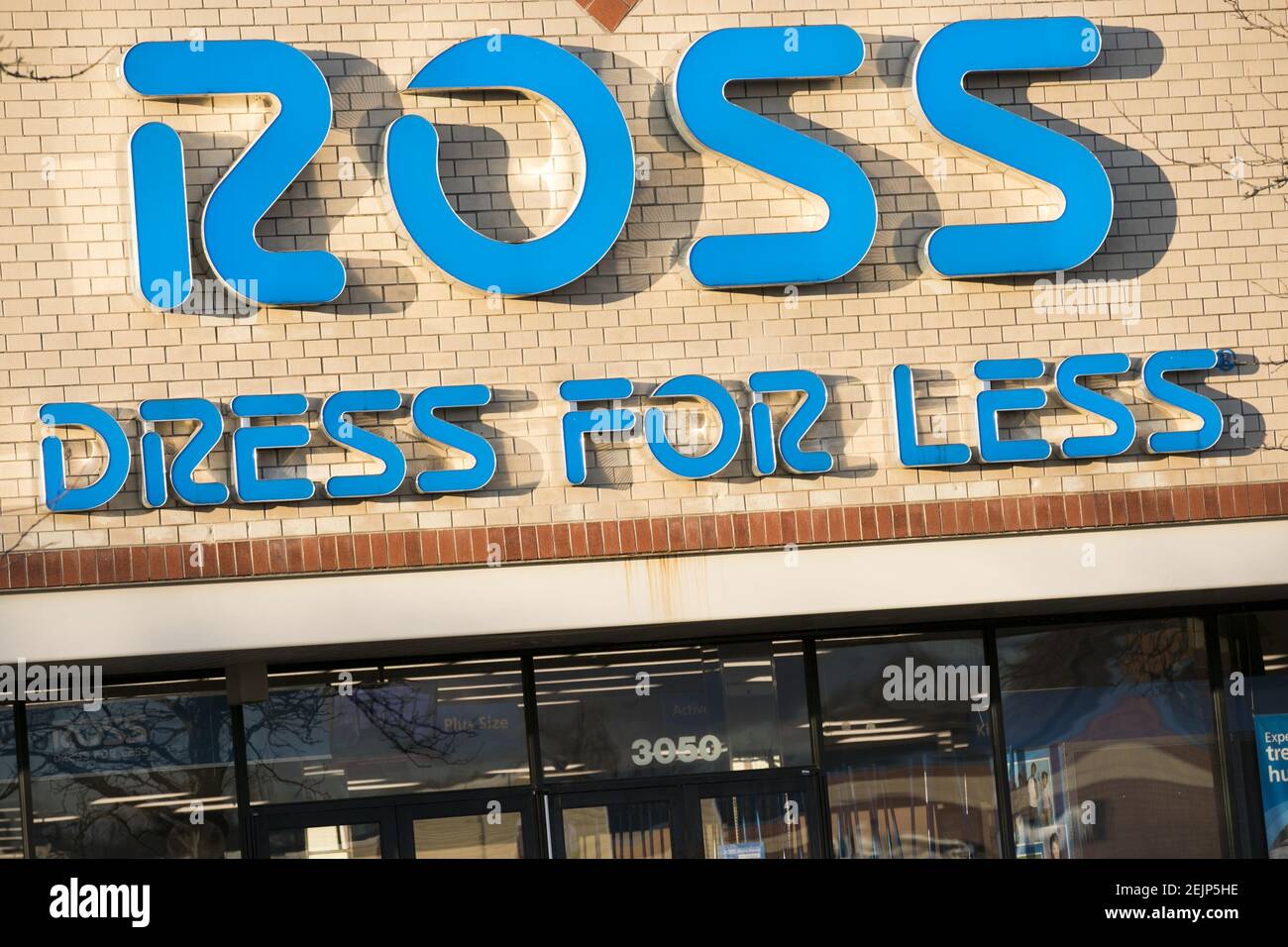 A logo sign outside of a Ross retail store location in Waldorf