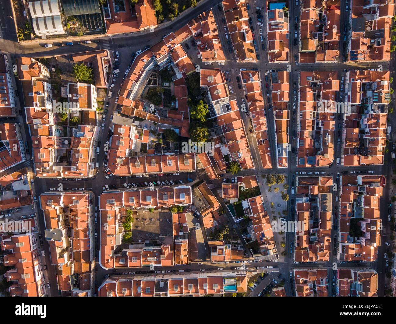 Aerial top down view of traditional residential neighbourhood at sunrise in the Belem District of Lisbon, Portugal. Stock Photo