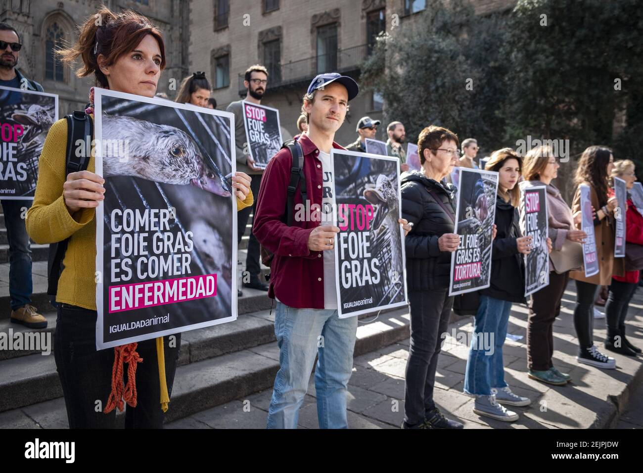 Animal activists hold placards denouncing the production of Foie Gras