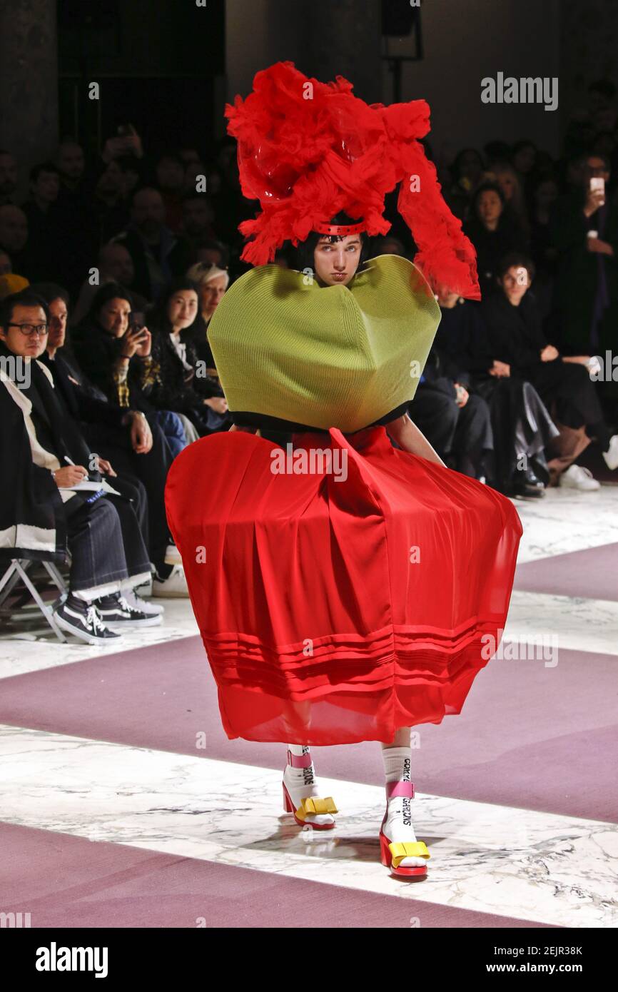 Model walks on the runway at the Comme Des Garcons fashion show