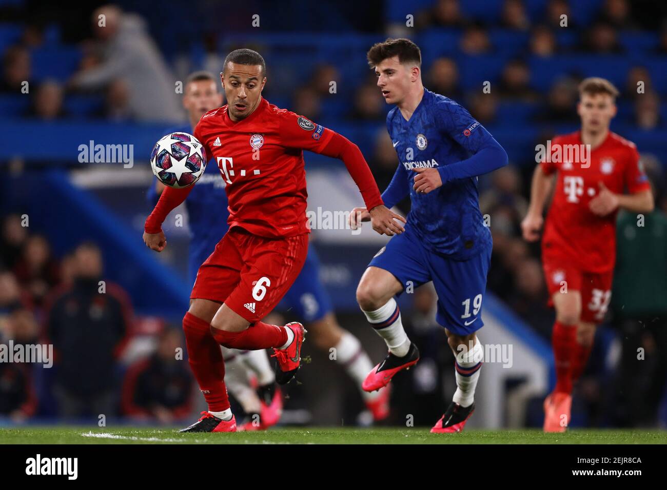 Thiago Alcantara of Bayern Munich and Mason Mount of Chelsea in action  during the UEFA Champions League – Round 16 First Leg match between Chelsea  and Bayern Munich at Stamford Bridge. Final