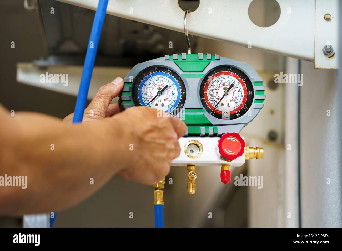 manometers on equipment for investigate and refueling of air conditioners by technician Stock Photo
