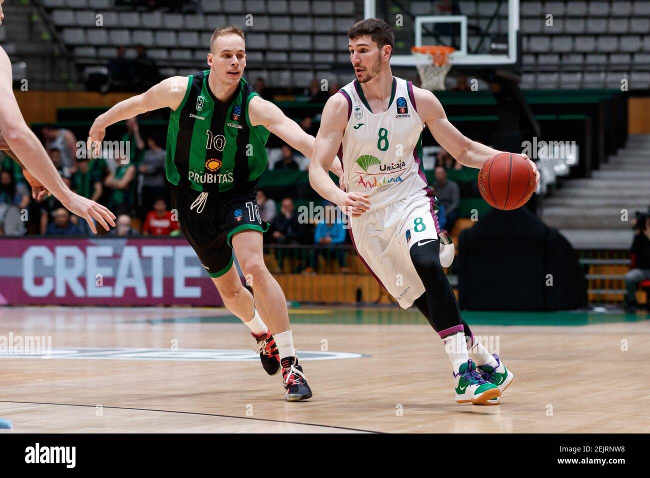Dario Brizuela of Unicaja Malaga In action with Klemen Prepelic of Joventut  Badalona during the ULEB EuroCup basketball second groups stage match,  Group H played between Joventut Badalona and Unicaja at Palau