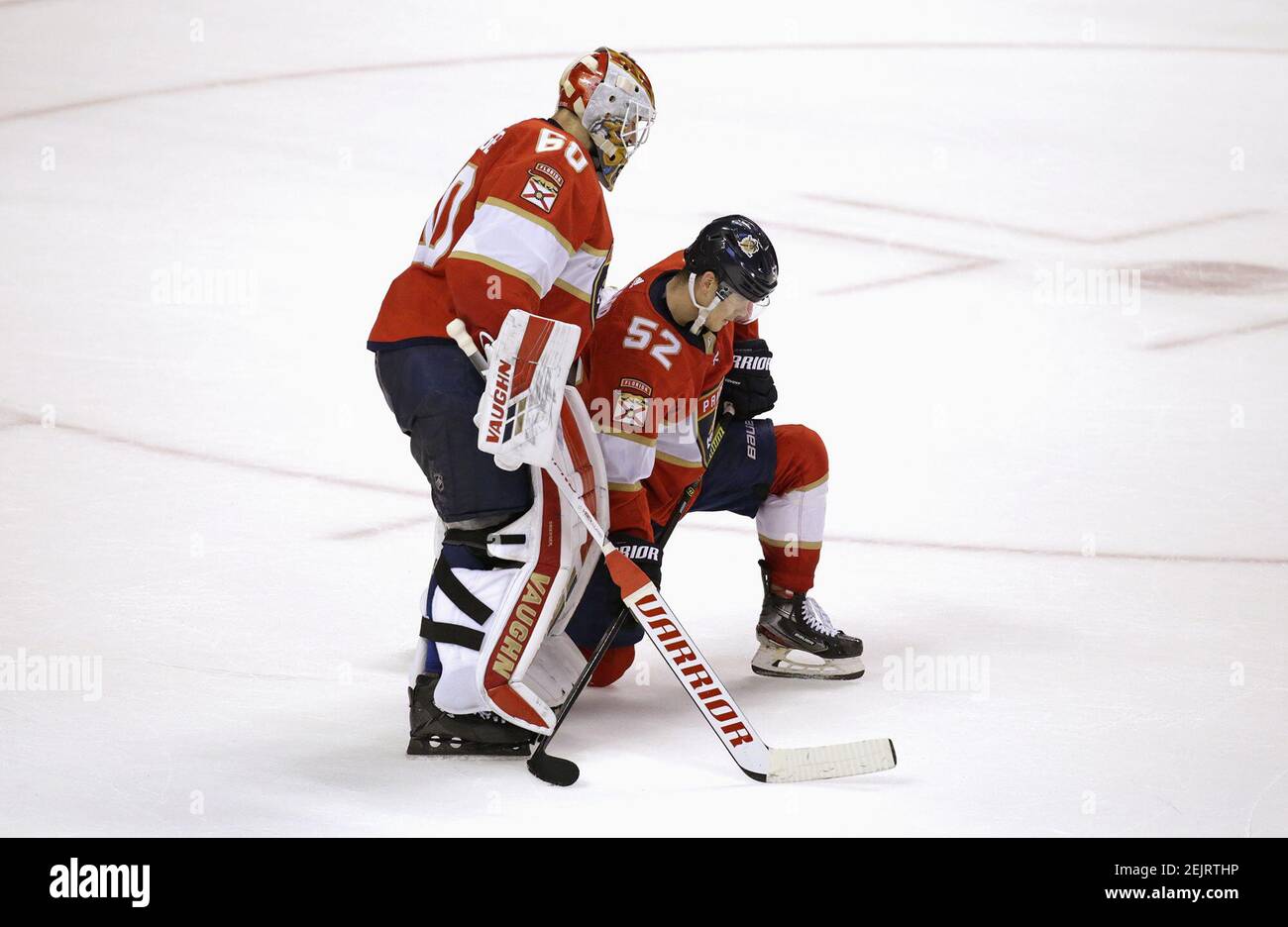 Florida Panthers goaltender Chris Driedger (60) and defenseman MacKenzie Weegar (52) react after the Boston Bruins' Torey Krug (47) scored the game-winning goal during overtimeÂ at the BB&T Center in Sunrise, Fla., on Thursday, March 5, 2020. The Bruins won, 2-1, in OT. (David Santiago/Miami Herald/TNS) Stock Photo