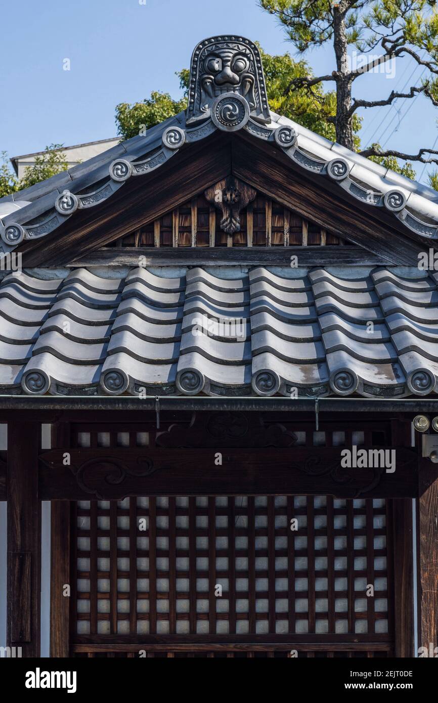 Traditional Japanese grey ceramic roofing tiles or kawara, on a roof at