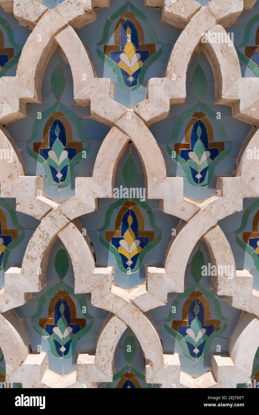 ornate masonry and tile patterns on a wall at a hassan ii mosque in casablanca, morroco Stock Photo