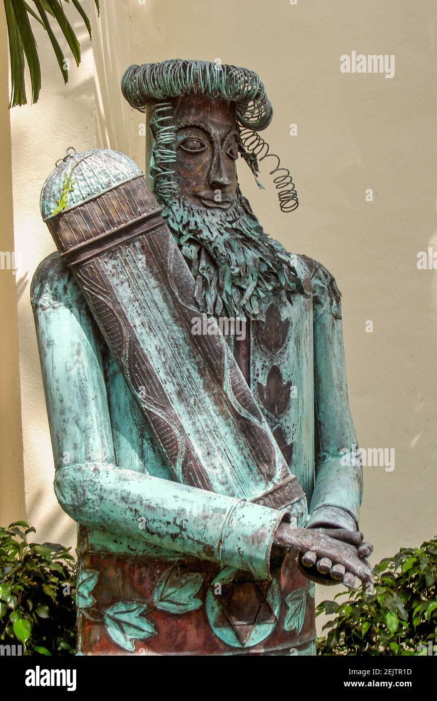 A contemporary sculpture of an elder holding a Torah scroll at the Sue and Leonard Miller Center for Contemporary Jewish Studies at the University of Stock Photo