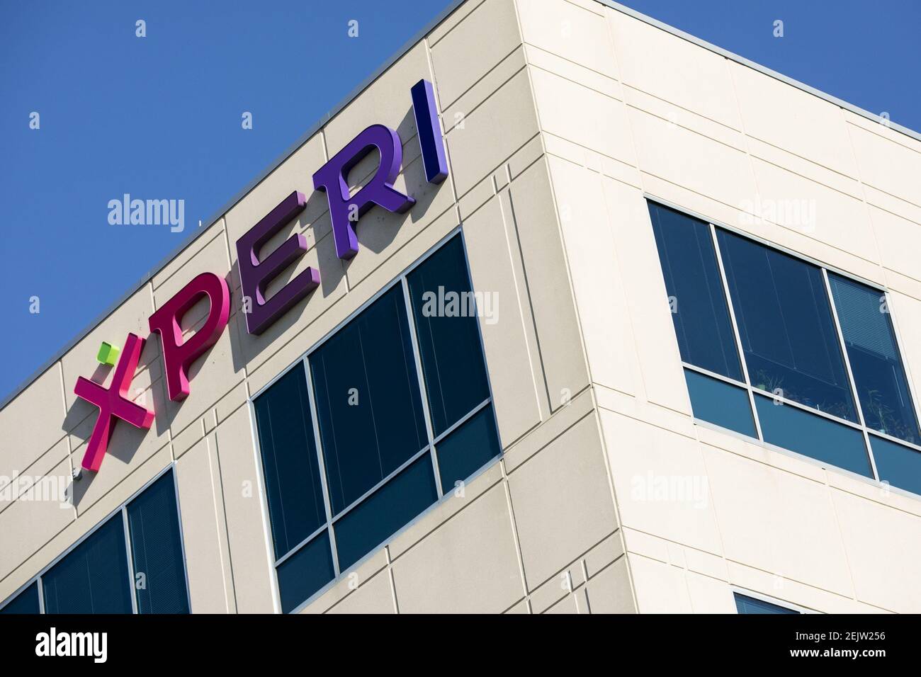 A logo sign outside of a facility occupied by Xperi Corporation in