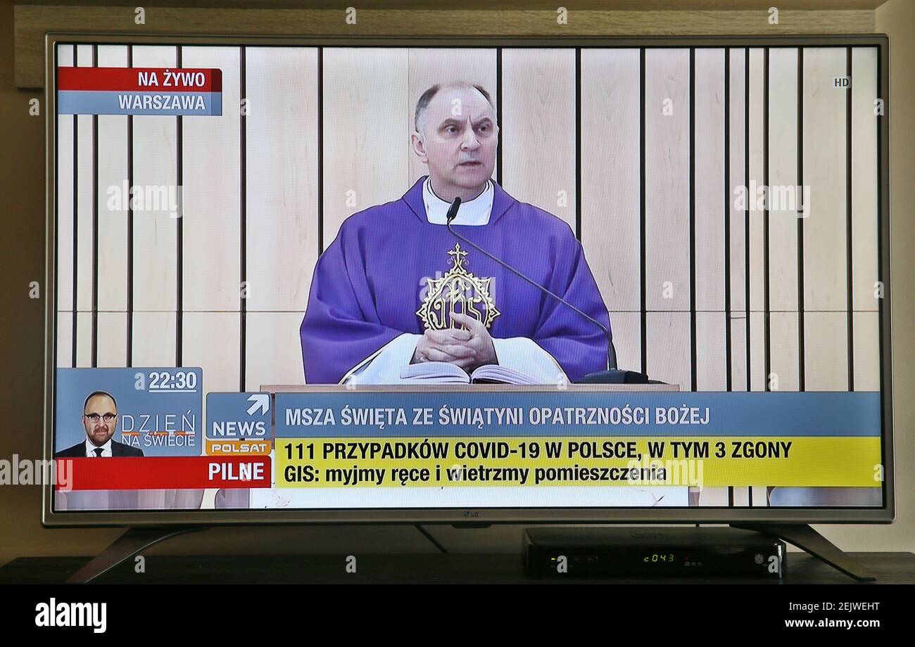 Broadcast of the mass from the Temple of Divine Providence in Warsaw on the Polast News channel. Due to the coronavirus epidemic, authorities in Poland banned public gatherings for groups of over 50 people. Polish clergy gave the faithful a dispensation from the obligation to participate in the Sunday mass. Poles participate in Sunday holy masses via television and radio broadcasts. (Photo by Damian Klamka / SOPA Images/Sipa USA) Stock Photo