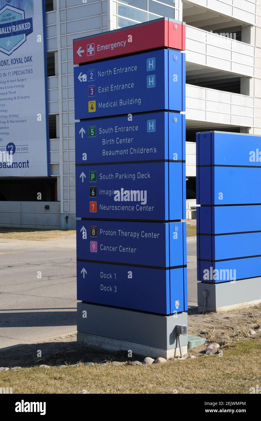 A sign outside of Beaumont Hospital is shown where COVID-19 drive 