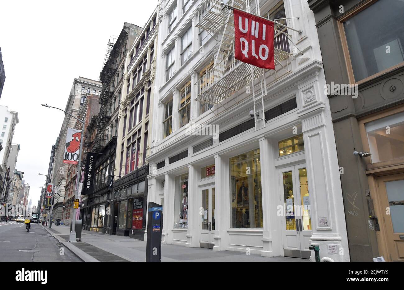 A closed Manhattan Soho UNIQLO store is seen in this photo devoid of any  pedestrians,Thursday, March 19, 2020 in New York. Fast Retailing Co. said  it will temporarily close all 50 of