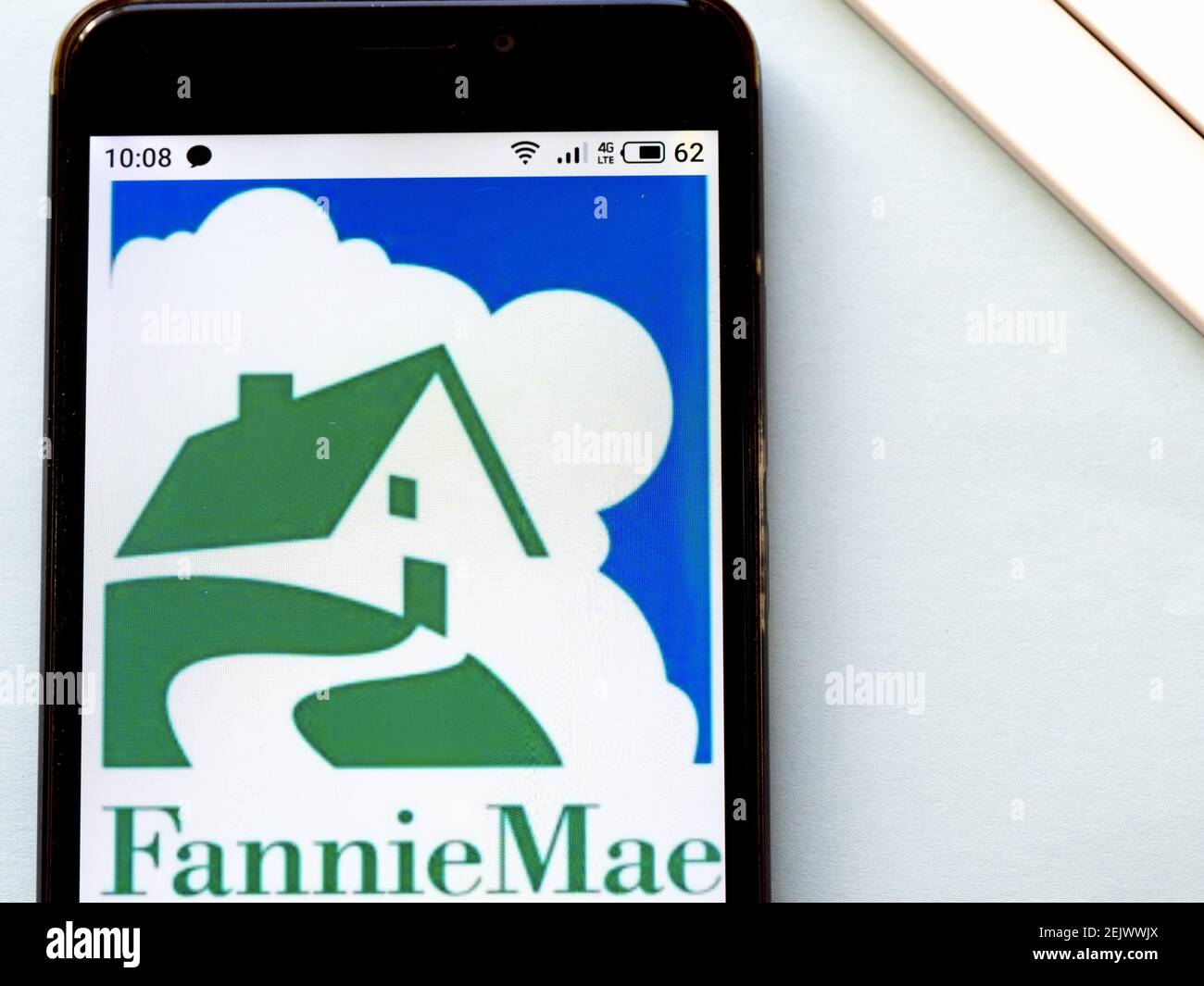 In this photo illustration a Fannie Mae logo seen displayed on a ...