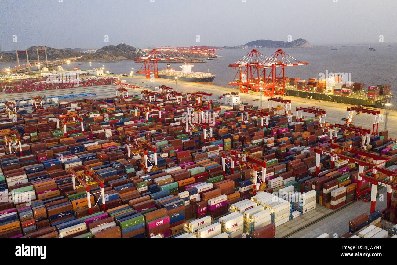 SHANGHAI, CHINA - MARCH 20, 2020 - A number of very large container ships  are berthed at the Shanghai ocean mountain port automation terminal in  Shanghai, China, March 20, 2020. With the