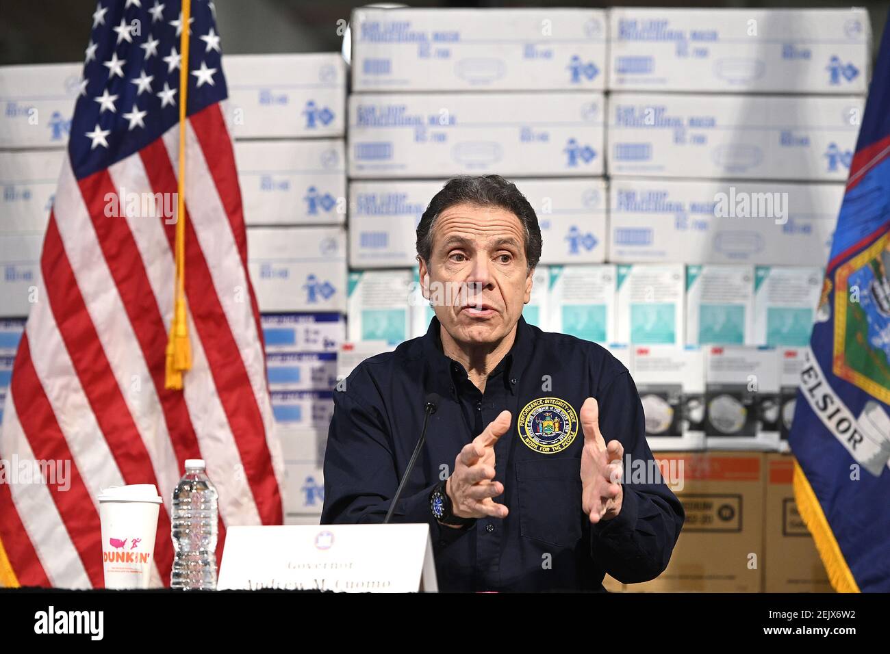 Against a backdrop of medical supplies, New York Gov. Andrew Cuomo