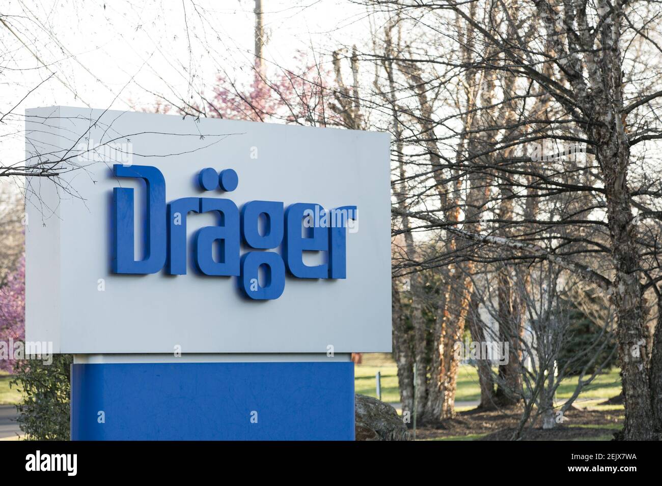 A logo sign outside of a facility occupied by Drägerwerk AG (Dräger) in