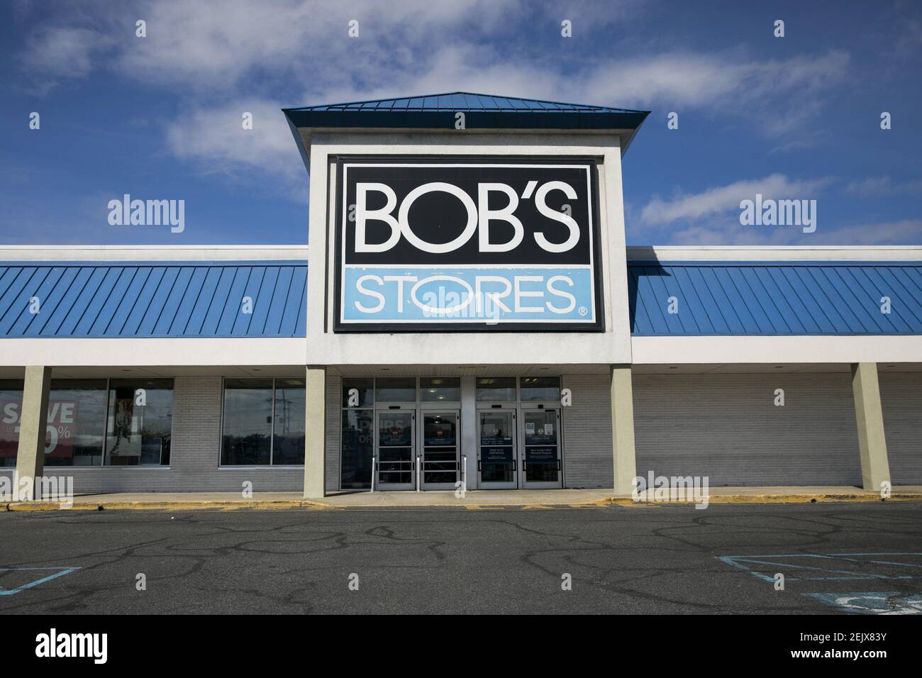 A logo sign outside of a Bob's Stores retail store location in Totowa