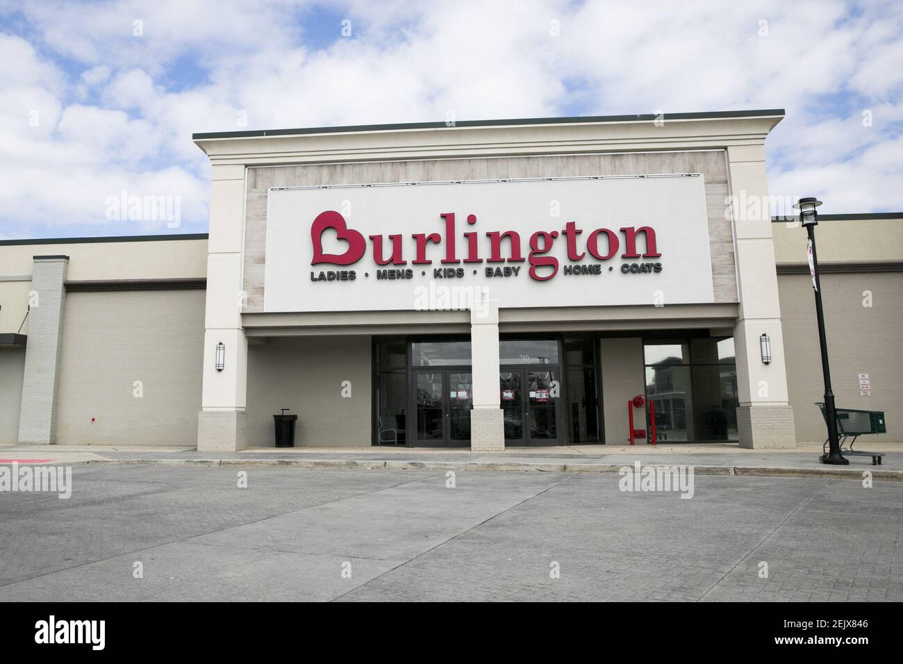 A logo sign outside of a Burlington retail store location in East