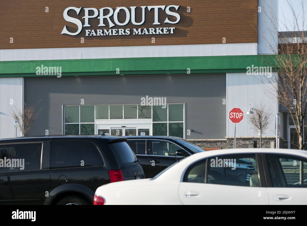 A logo sign outside of a Sprouts Farmers Market retail grocery store