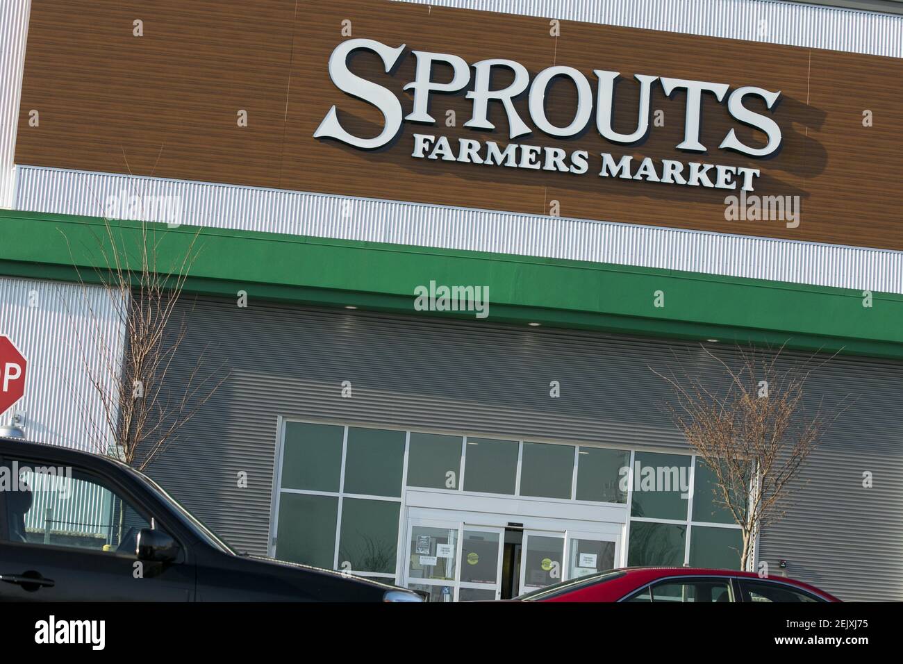 A logo sign outside of a Sprouts Farmers Market retail grocery store