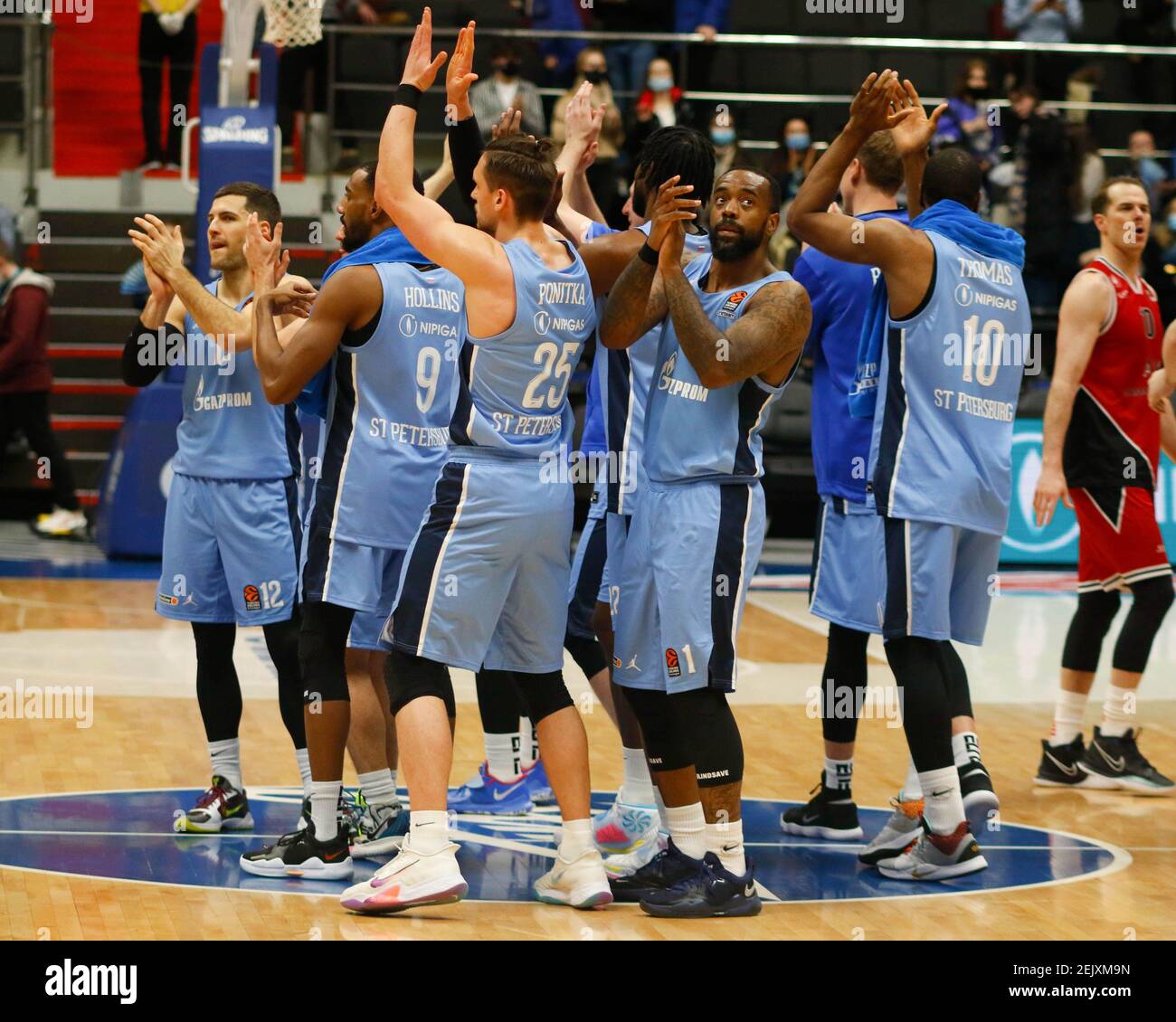 Saint Petersburg, Russia. 22nd Feb, 2021. Zenit basketball players  celebrate during the 2020/2021 Turkish Airlines EuroLeague Regular Season  Round 25, match between FC Olimpia Milano and Zenit St. Petersburg at the  Sibur