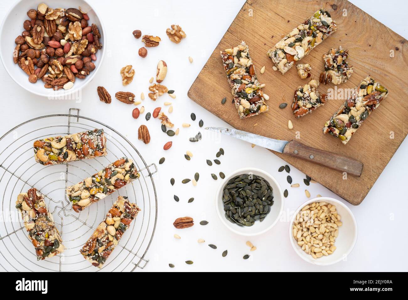 Homemade honey, nut and seed bars on a white background Stock Photo Alamy