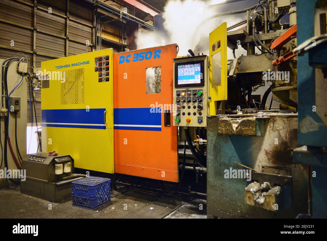 A Toshiba DC 350R Die Casting Machine is seen producing parts required in the production of