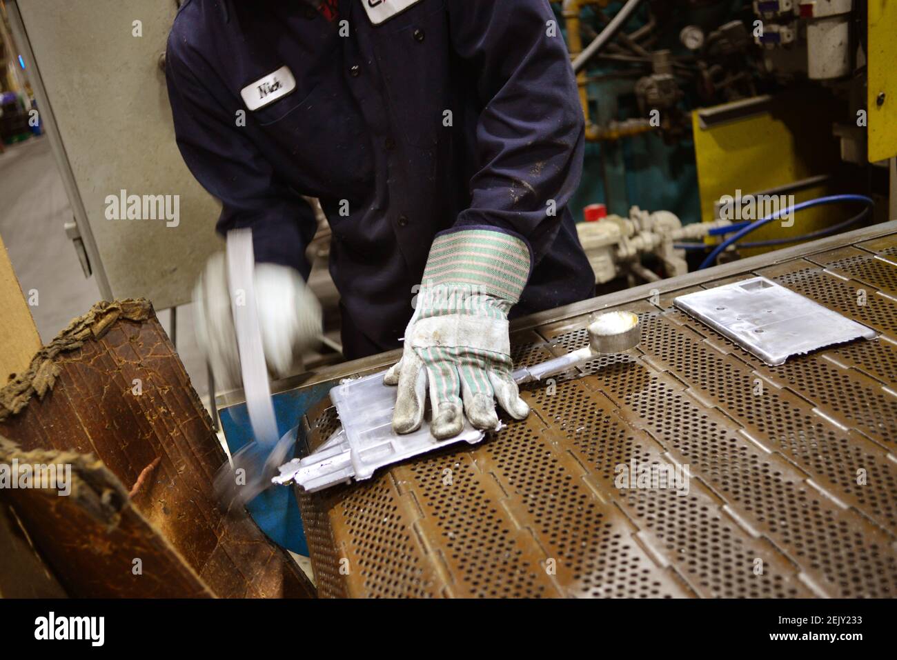Operator, Nick Kennedy works at a Die Casting Machine producing parts