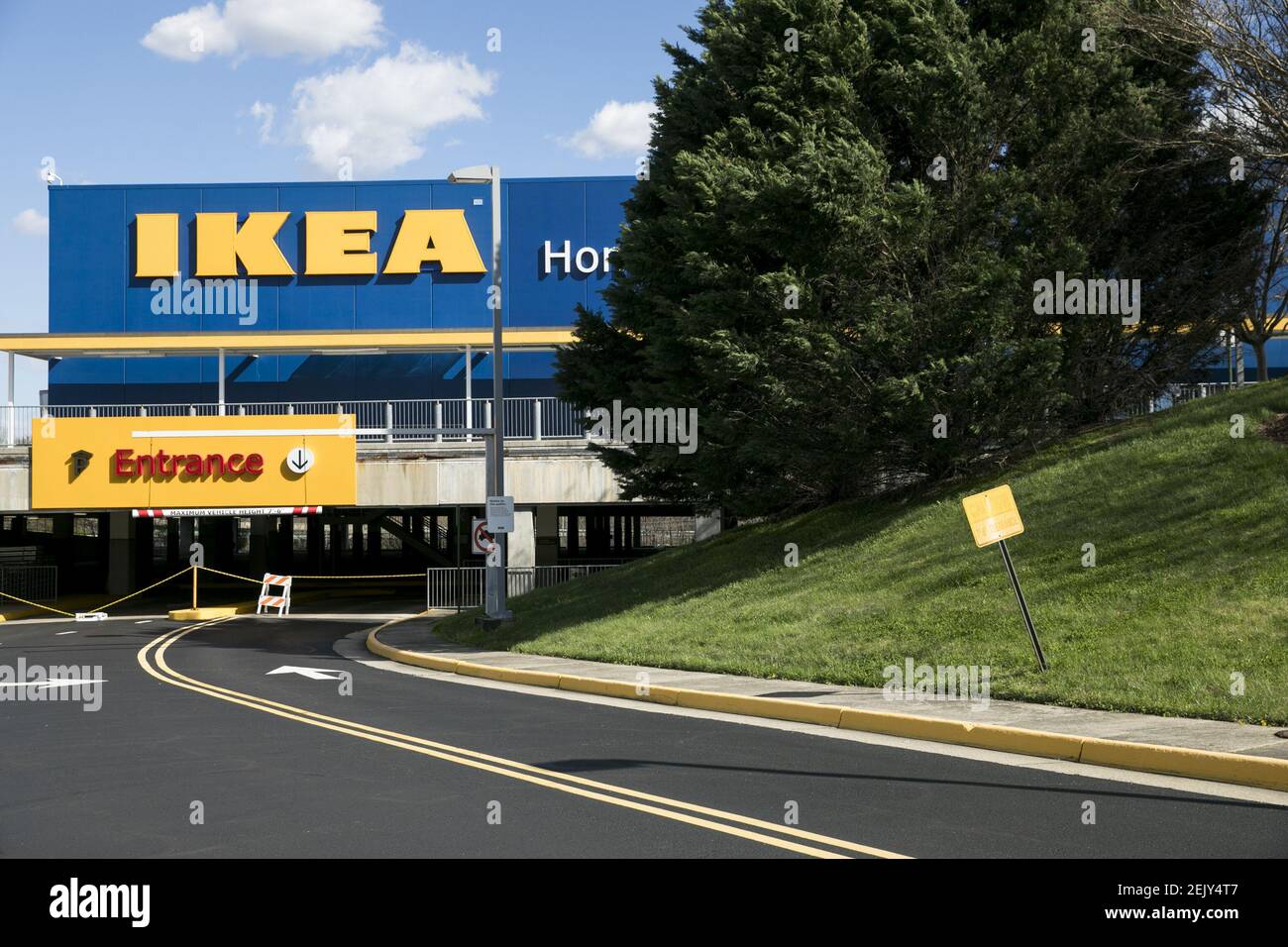 A logo sign outside of a Ikea retail store location in Woodbridge