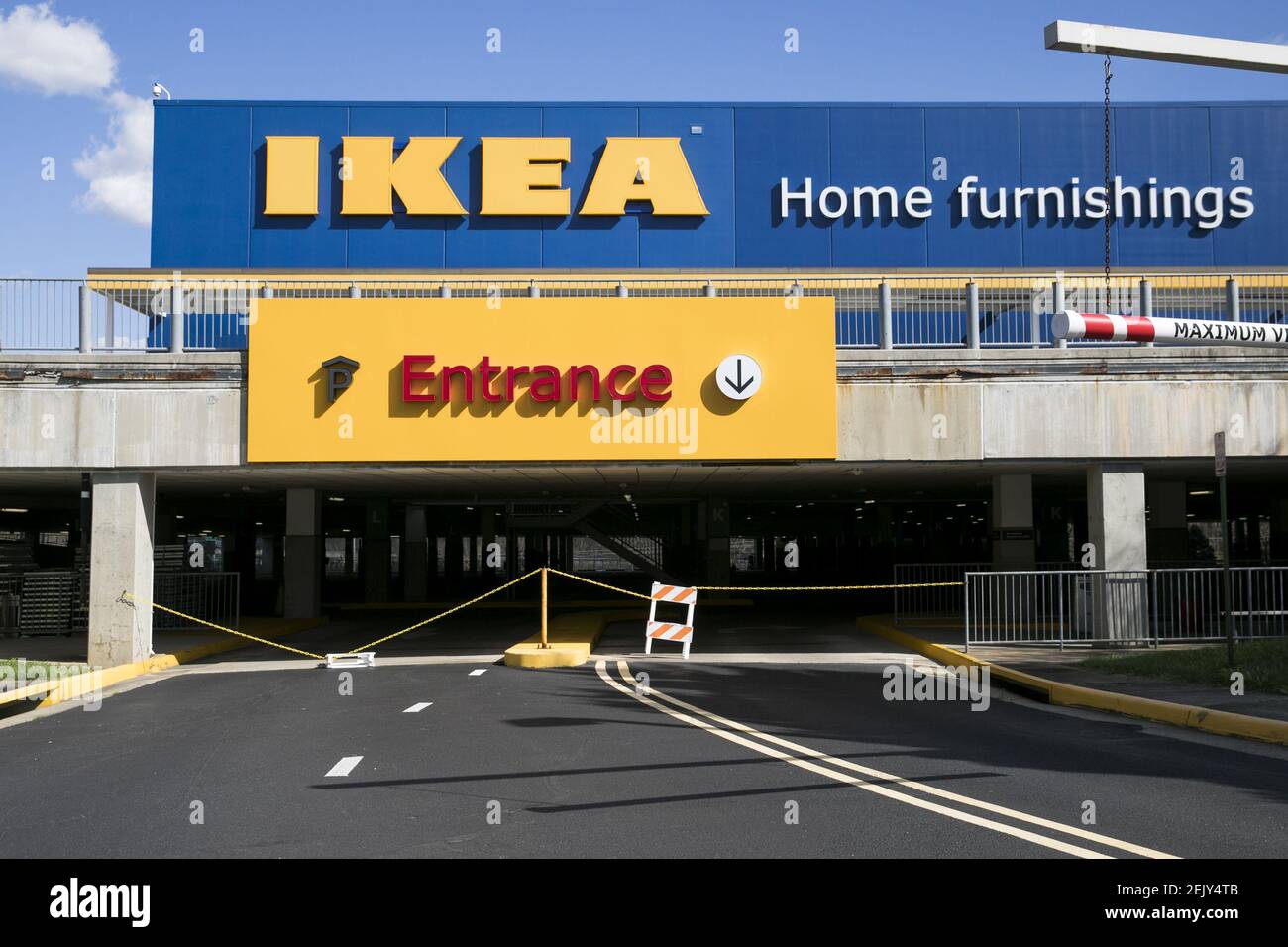 A logo sign outside of a Ikea retail store location in Woodbridge