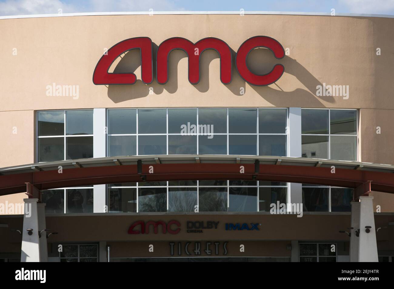 A logo sign outside of a AMC Theatres location in Woodbridge, Virginia