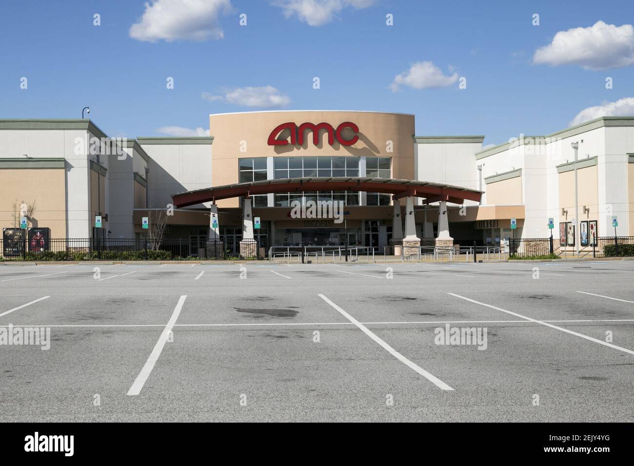A logo sign outside of a AMC Theatres location in Woodbridge, Virginia