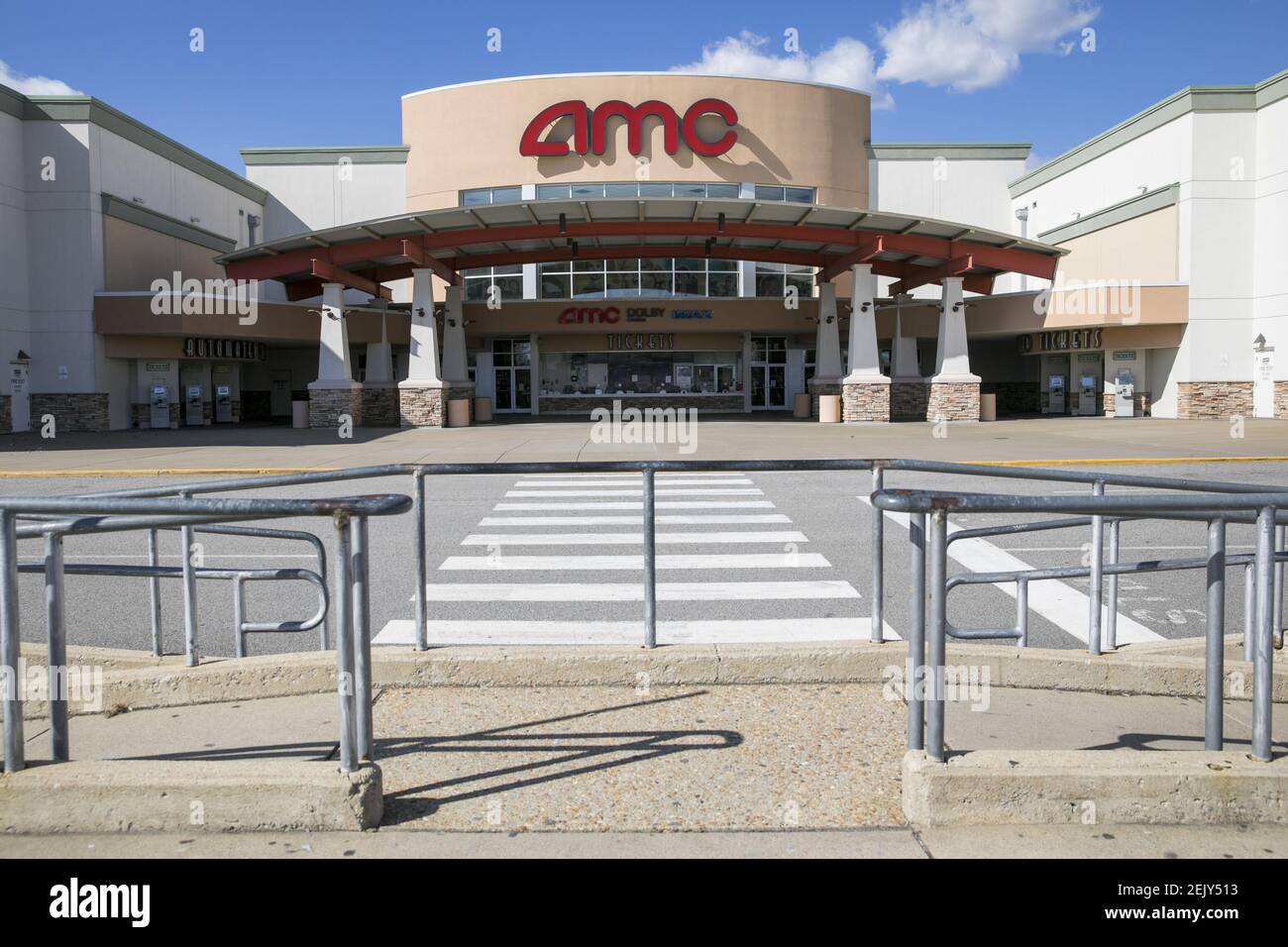 A logo sign outside of a AMC Theatres location in Woodbridge, Virginia