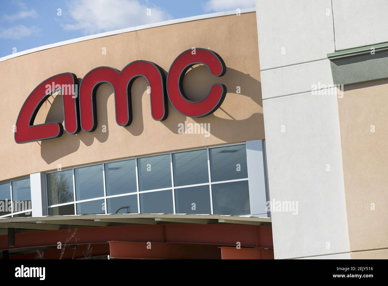 A logo sign outside of a AMC Theatres location in Woodbridge, Virginia