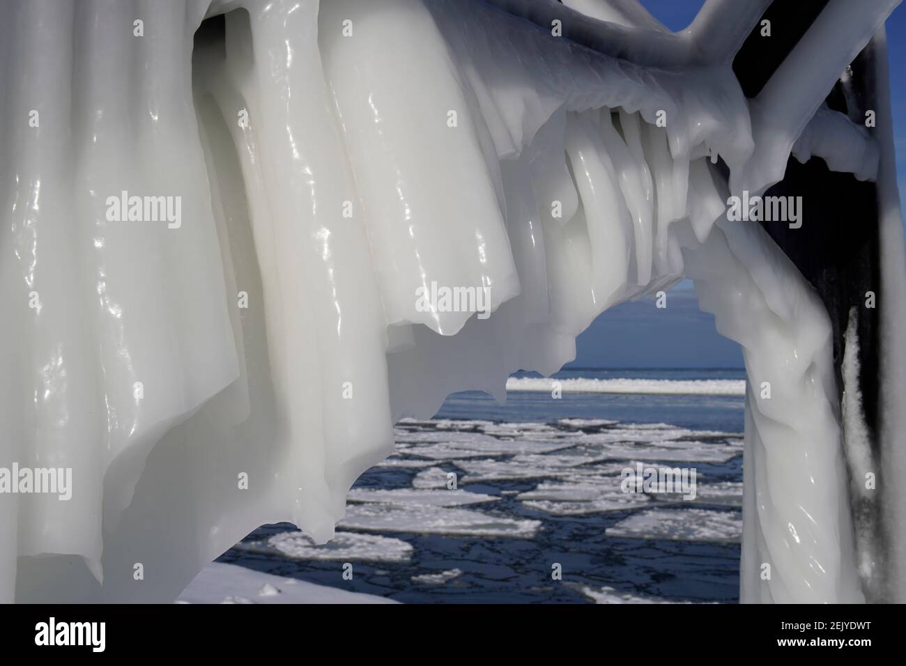 Ice Formation in Grand Haven, Michigan. February 2021, the ice covered Grand Haven's inner light, landscape Stock Photo