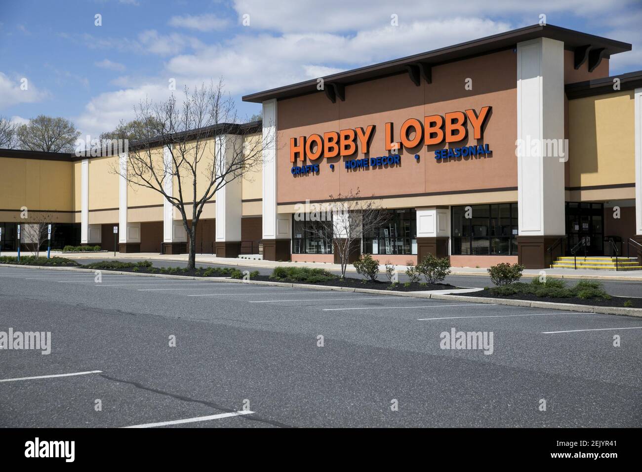 A logo sign outside of a Hobby Lobby retail store location in Deptford