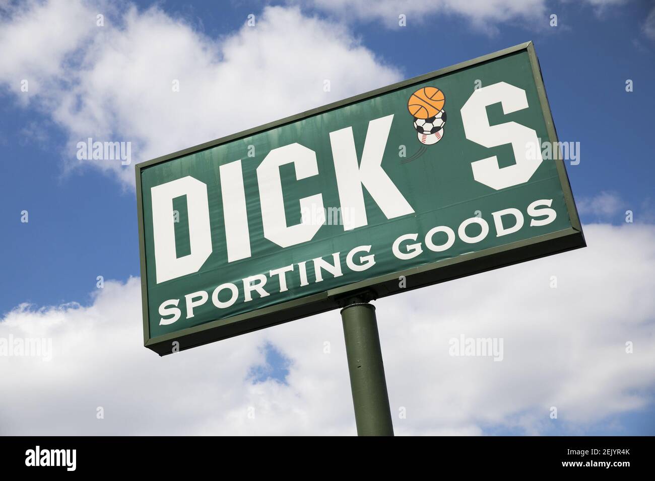 A logo sign outside of a Dick's Sporting Goods retail store location in