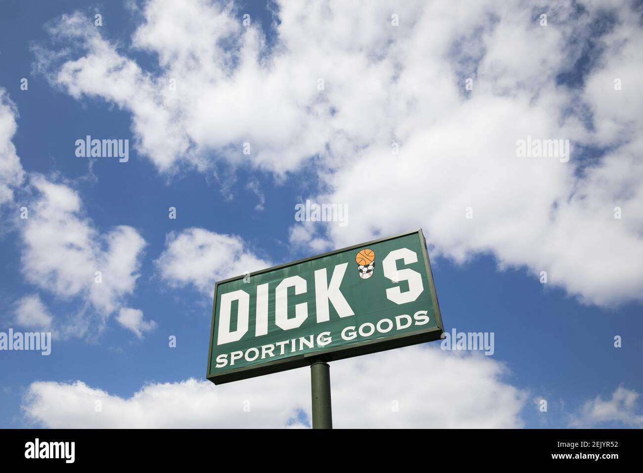A logo sign outside of a Dick's Sporting Goods retail store location in