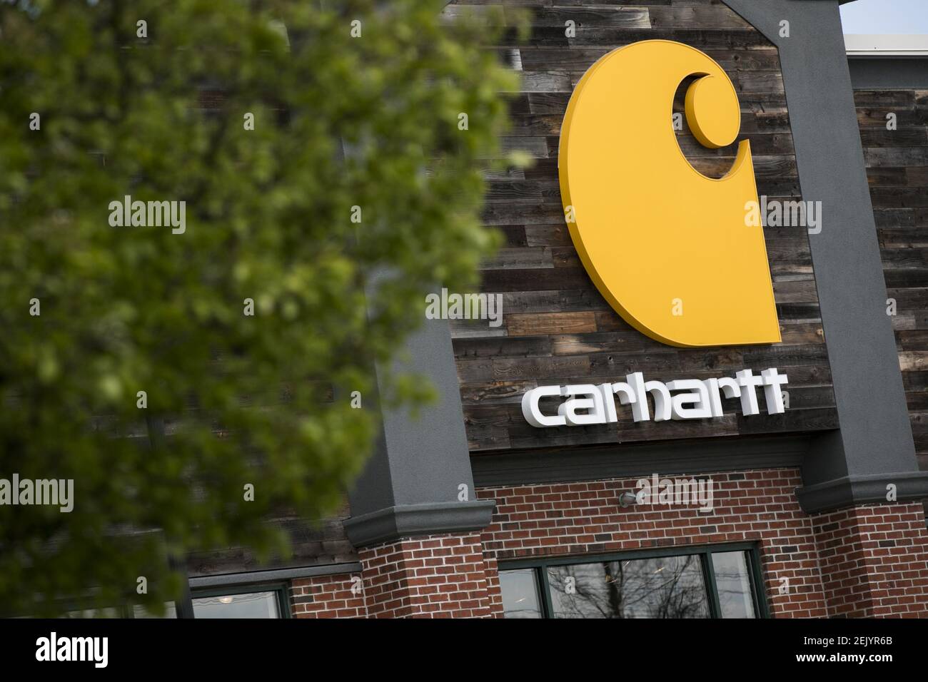 A logo sign outside of a Carhartt retail store location in Cherry Hill, New Jersey on April 11, 2020. (Photo by Kristoffer Tripplaar/Sipa USA) Stock Photo