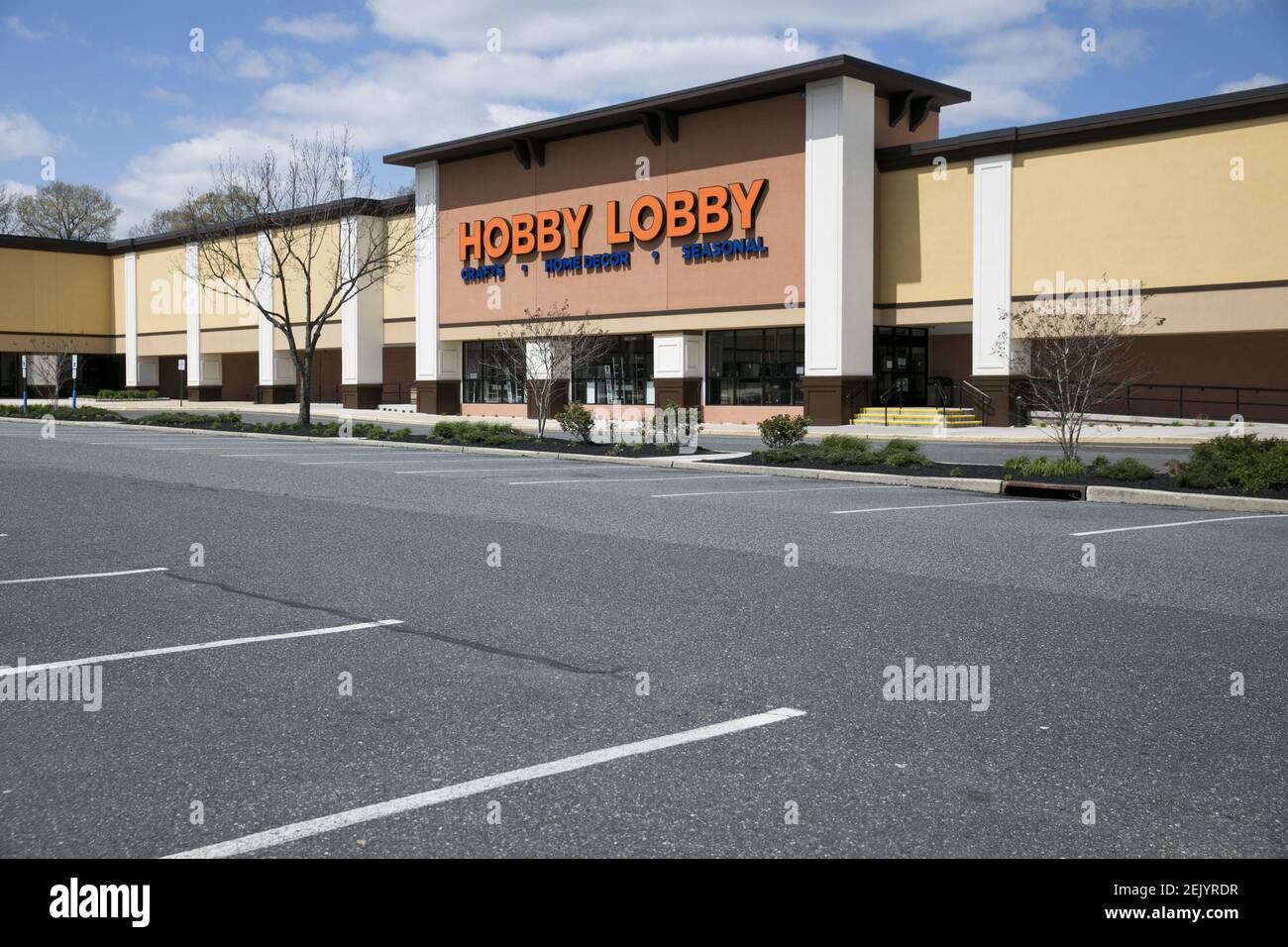 A logo sign outside of a Hobby Lobby retail store location in Deptford