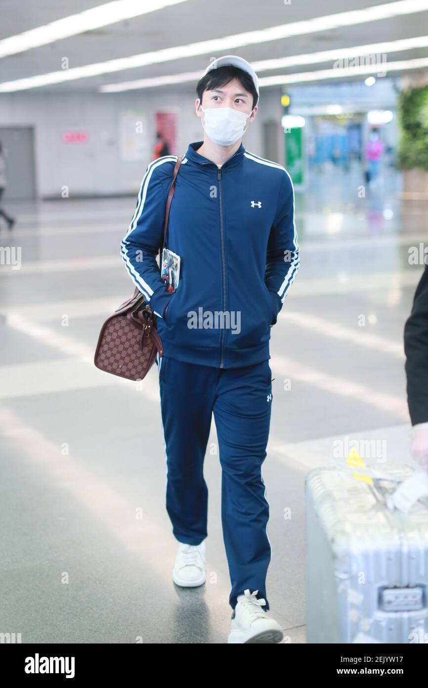 Chinese actor Mao Zijun arrives at a Beijing airport before departure in  Beijing, China, 14 April 2020. Sports outfit: Under Amour Bag: Gucci (Photo  by Stringer/ChinaImages/Sipa USA Stock Photo - Alamy