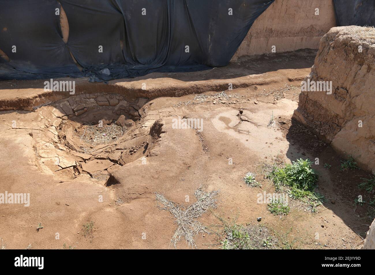Henanï¼ŒCHINA-Photo taken on April 12, 2020 shows the xindan archaeological excavation site in bozhuang town, beiguan district, anyang city, henan province. Duan shulin, chief editor of the official office of the compilation of records in baizhuang town, said that the archaeological excavation was divided into three areas from north to south along the zhonghua road, namely, A, B and C. In the blue enclosure, some have started backfilling. Archaeological evidence shows that xindian site in anyang, henan province is the largest copper casting site in the late shang dynasty. In the area of 4000 s Stock Photo