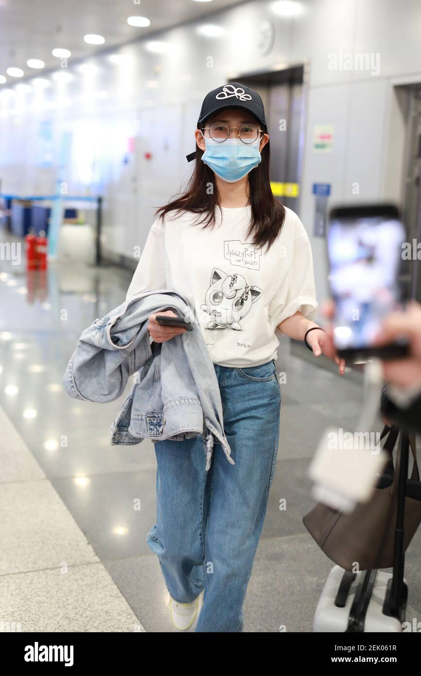 Chinese actress Chen Yuqi or Yukee Chen arrives at a Beijing airport ...