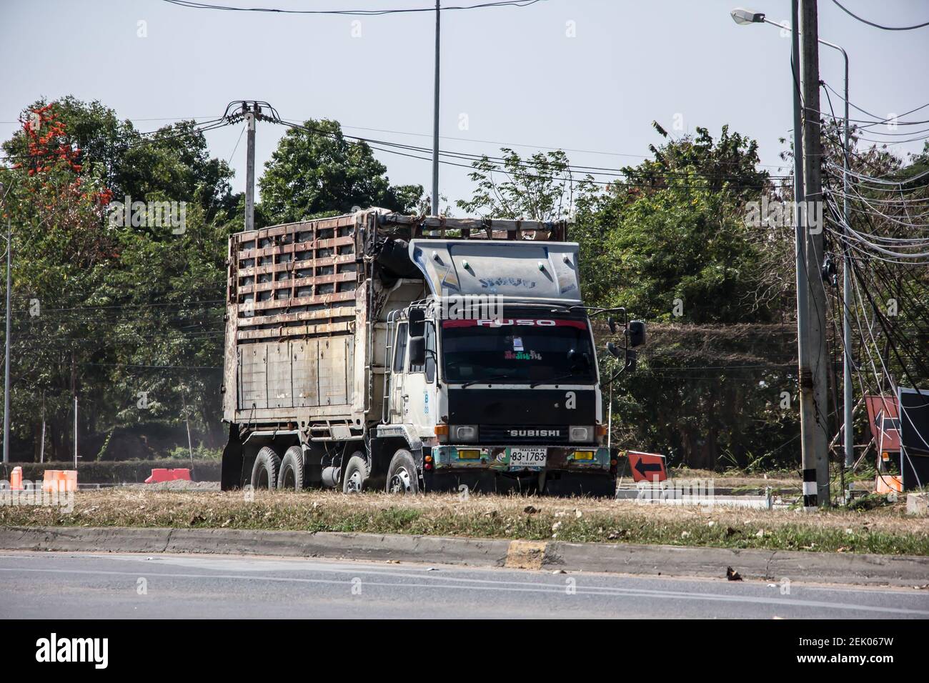 Chiangmai, Thailand - February  9 2021: Private Mitsubishi Fuso  Cargo Truck.  Photo at road no.121 about 8 km from downtown Chiangmai, thailand. Stock Photo