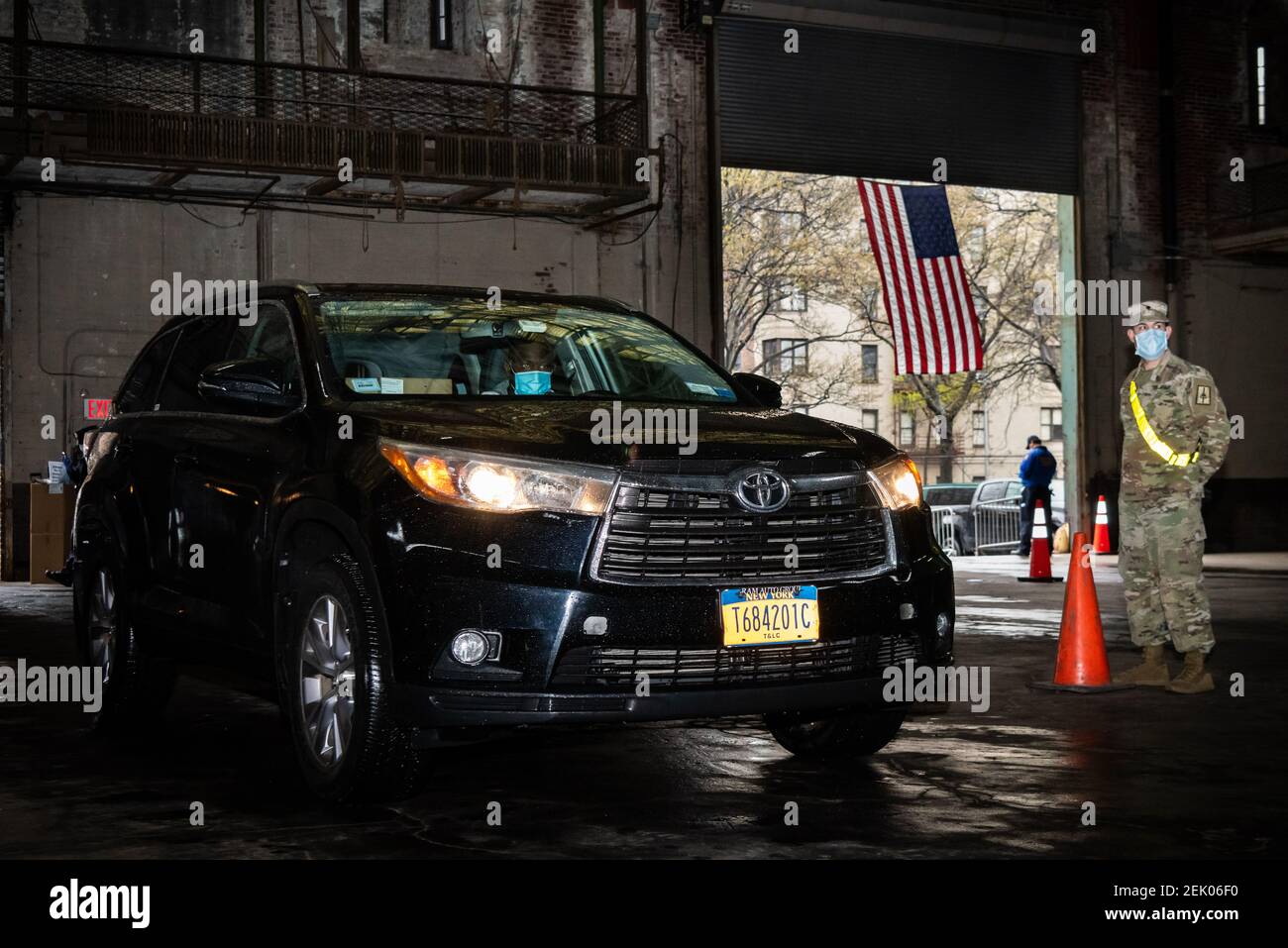 A soldier of the U.S. Army instructs a cab driver at the Kingsbridge ...