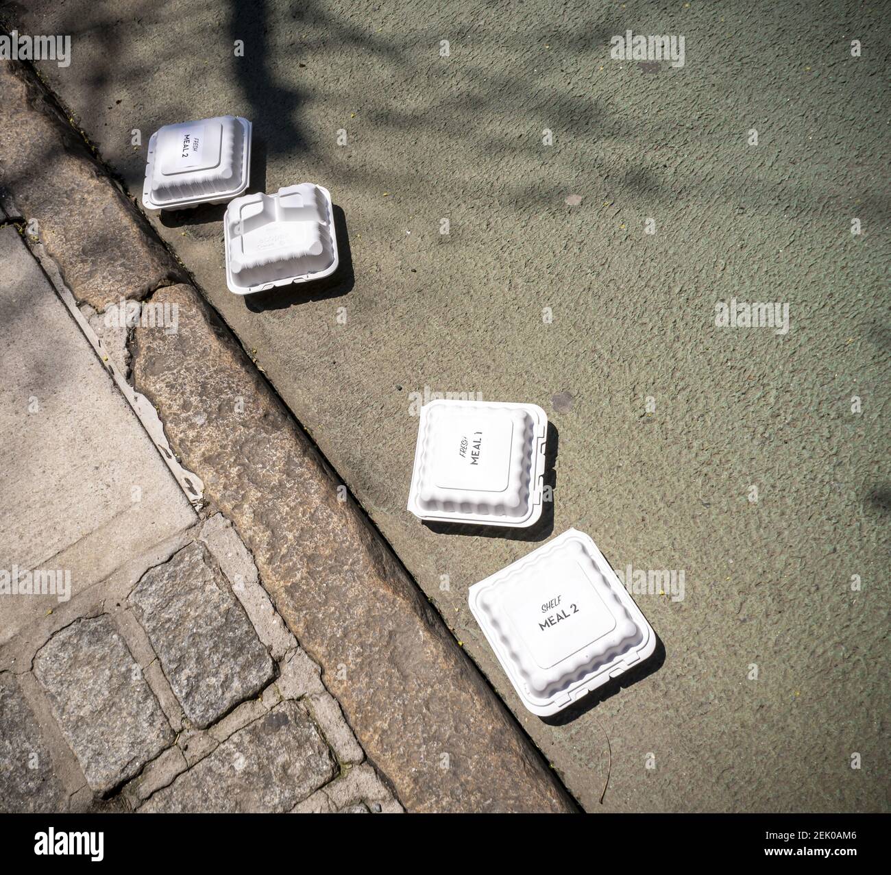 Empty recyclable clamshell containers from meal distribution programs