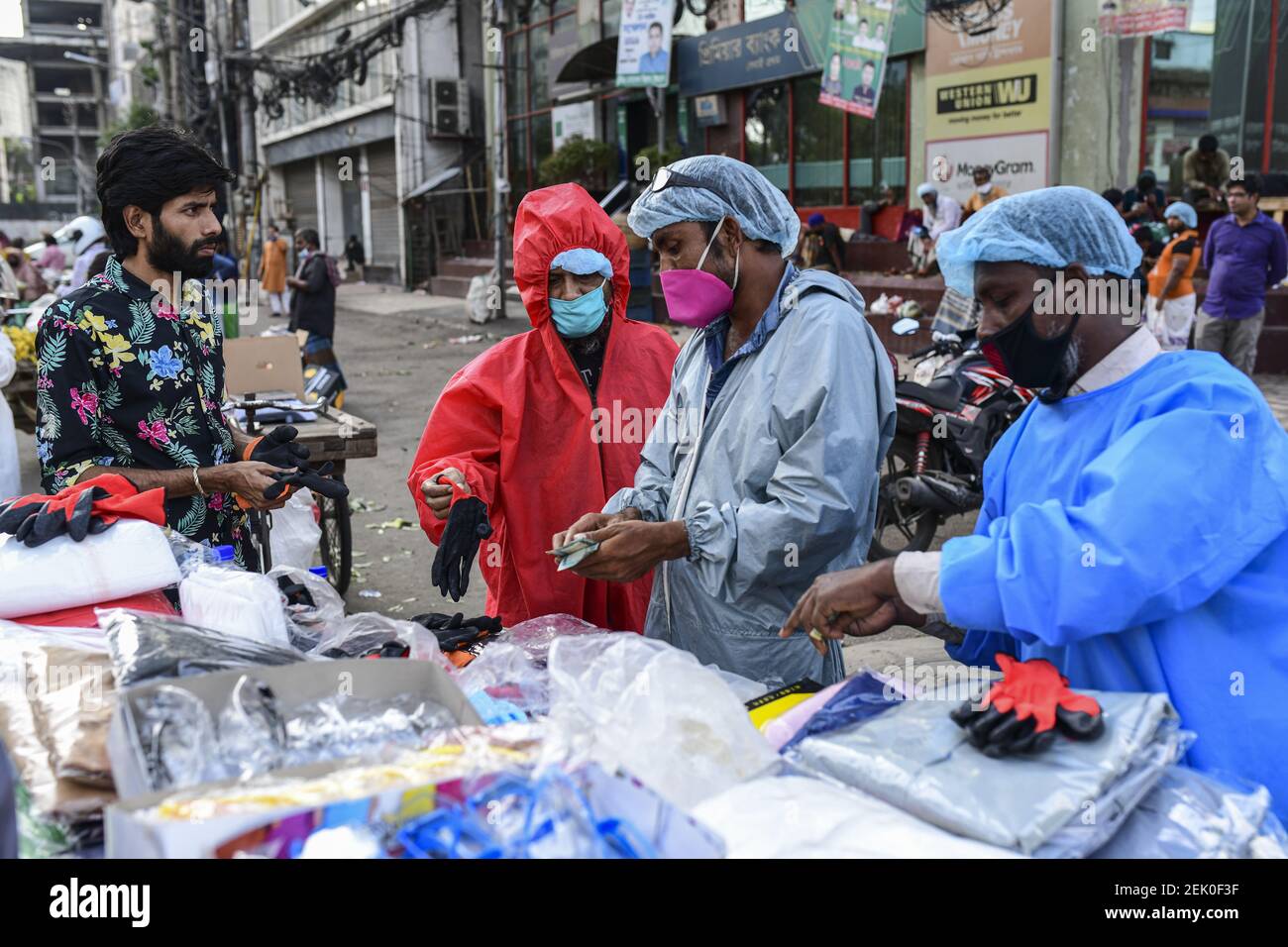 People buy personal protective equipment (PPE), facemasks, gloves and