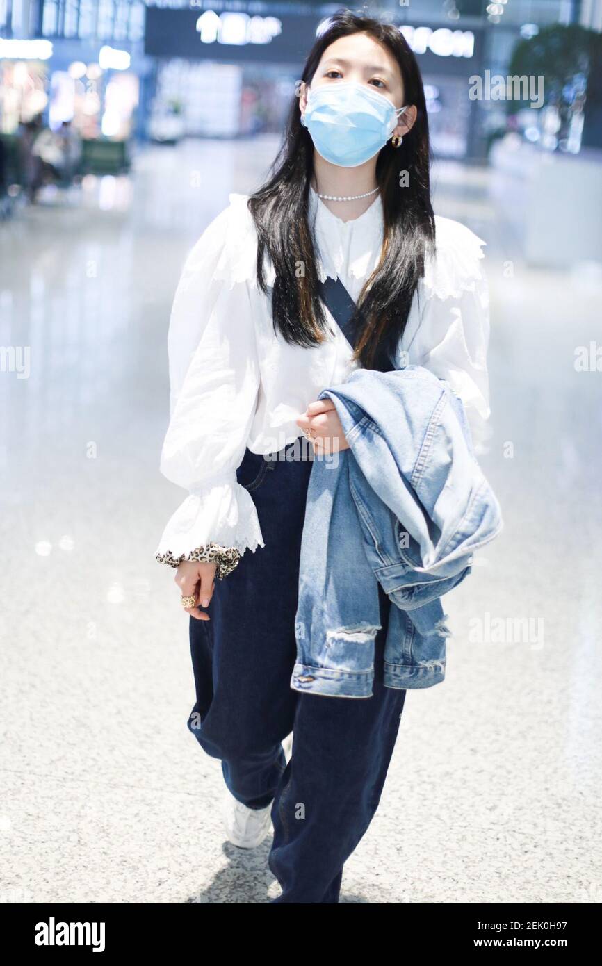 Chinese actress Zhang Ruonan arrives at a Beijing airport before ...