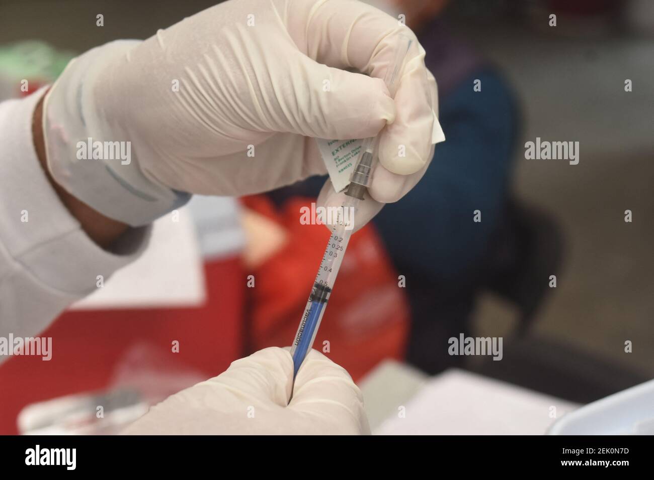 A Health worker prepares a Sinovac vaccine to inject a persons against coronavirus disease (COVID-19), during a mass vaccination to elderly persons at Las Americas Sport Center on February 22, 2021 in Ecatepec, State of Mexico, Mexico. Photo by Jose M. Ruiz/Eyepix/ABACAPRESS.COM Stock Photo