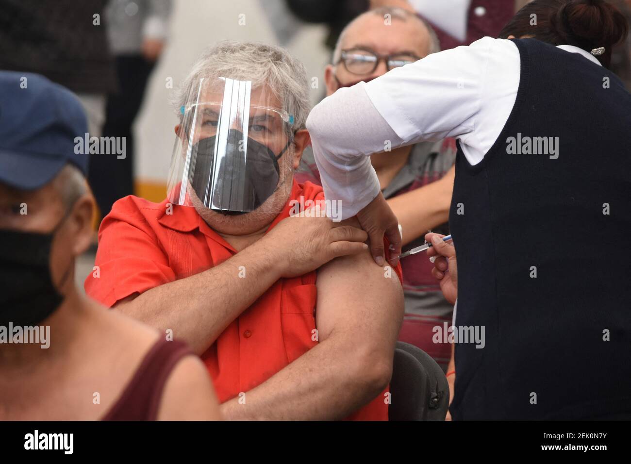 A person receives a inject of the Sinovac vaccine against coronavirus disease (COVID-19), during a mass vaccination to elderly persons at Las Americas Sport Center on February 22, 2021 in Ecatepec, State of Mexico, Mexico. Photo by Jose M. Ruiz/Eyepix/ABACAPRESS.COM Stock Photo