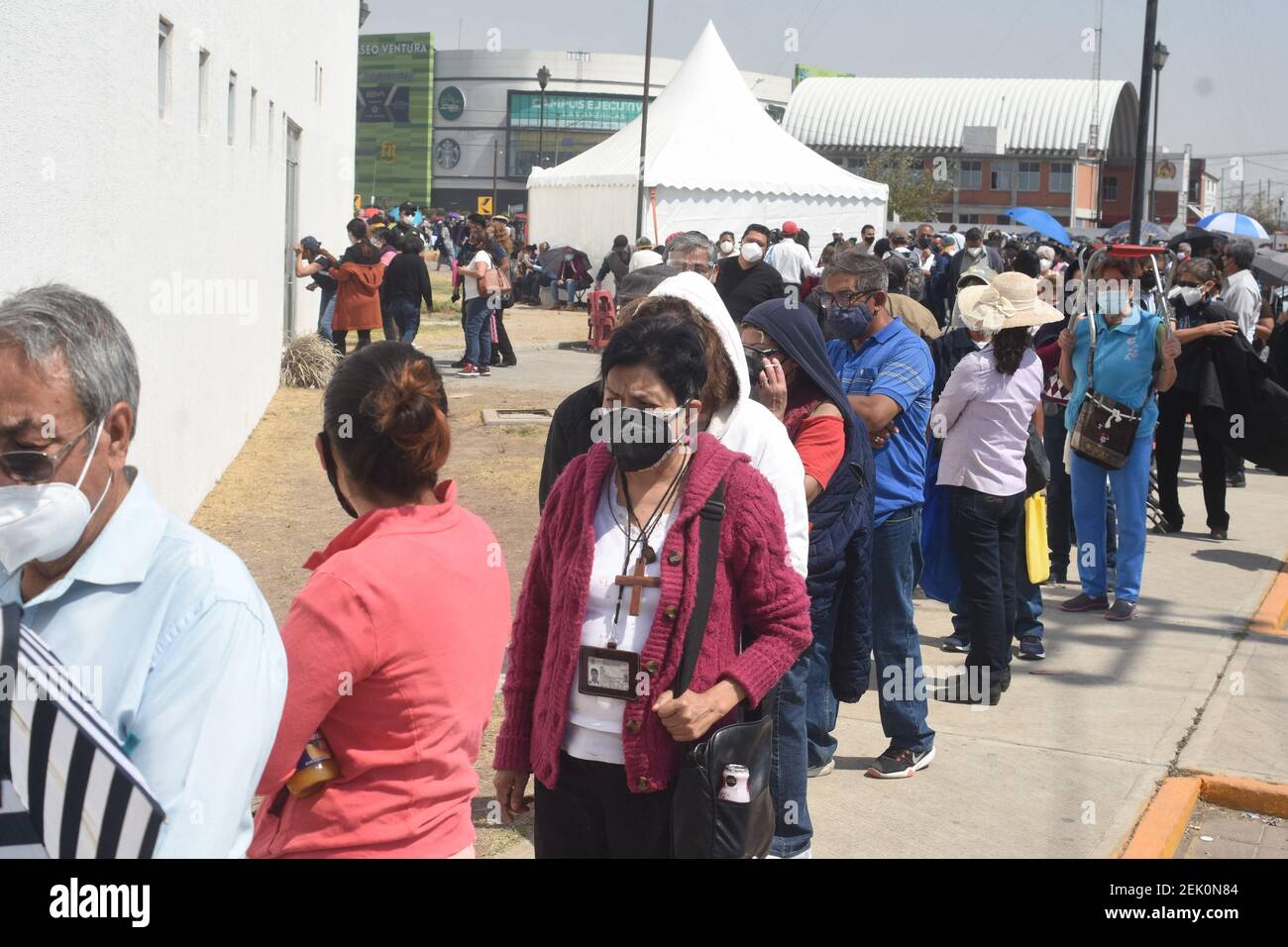 Persons wait to be injected with a dose of Sinovac vaccine against coronavirus disease (COVID-19) , during a mass vaccination to elderly persons at Las Americas Sport Center on February 22, 2021 in Ecatepec, State of Mexico, Mexico. Photo by Jose M. Ruiz/Eyepix/ABACAPRESS.COM Stock Photo
